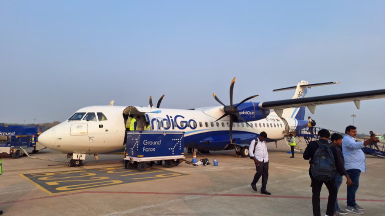 Security alert at Kolkata airport: IndiGo flight to Shillong shifted to isolation bay after a threat note was found onboard. Passengers safely evacuated.